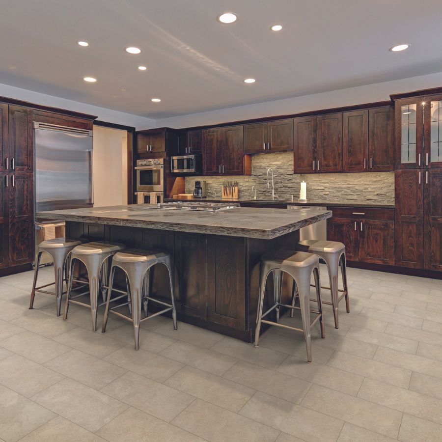 grey stone countertops in a modern kitchen with dark wood cabinets